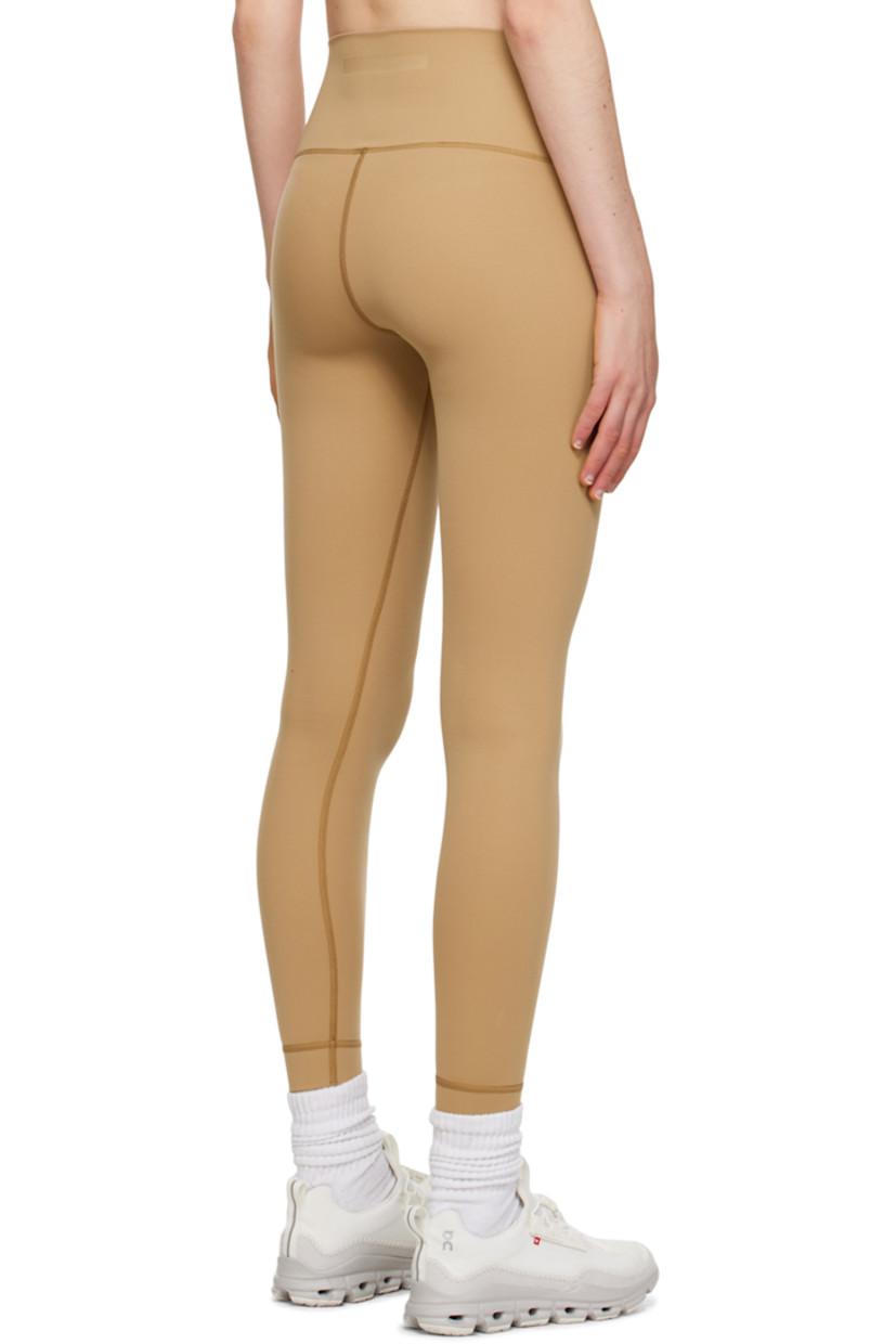 Stretch 206 gsm nylon jersey leggings. Moisture-wicking and quick-drying.

· Overlock stitching throughout
· High-rise
· Logo embossed at back waistband

Supplier color: Sand