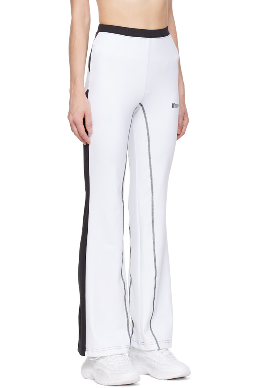 Flared stretch polyester jersey lounge pants. Paneled construction. 

· Elasticzed waistband 
· Logo printed at front 
· Contrast stitching in black 

Supplier color: White/Black