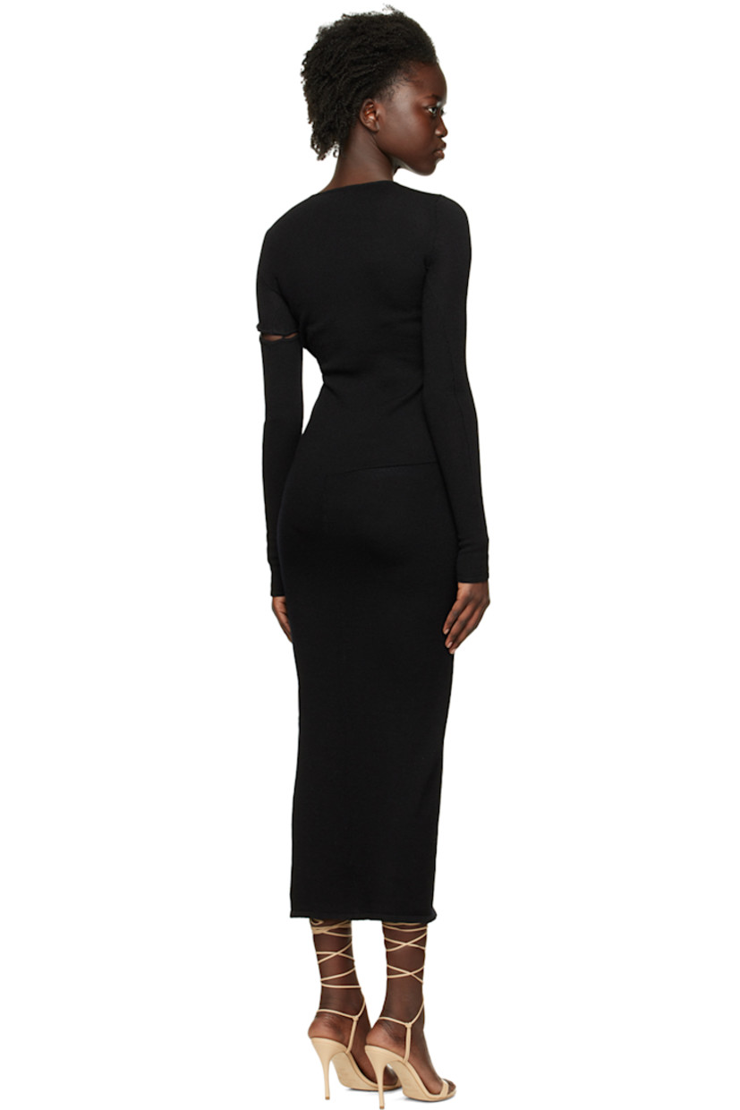 Knit virgin wool dress. 

· Rib knit crewneck, hem, and cuffs 
· Cut-out with button closure at front 
· Detachable sleeve 

Supplier color: Black