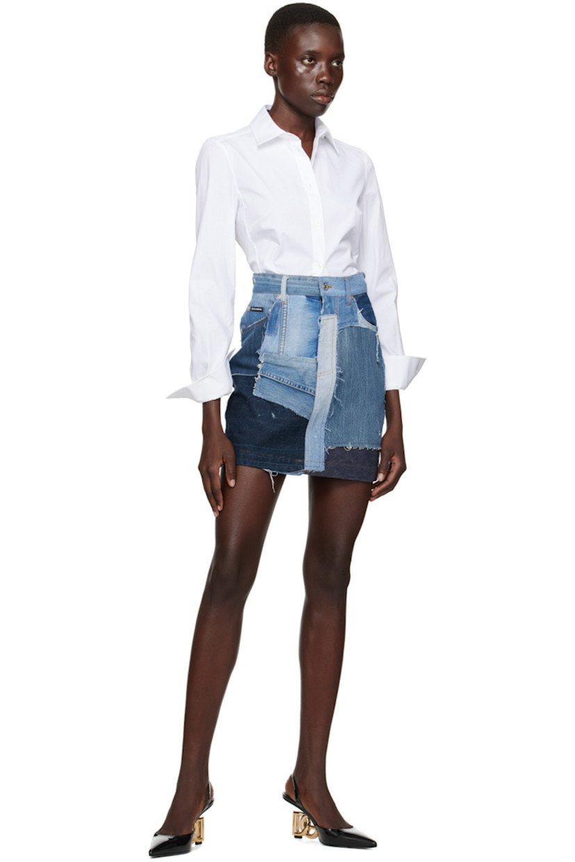 Non-stretch denim skirt. Fading and distressing throughout.

· Belt loops
· Five-pocket styling
· Zip-fly
· Logo appliqué at back pocket
· Logo-engraved silver-tone hardware

Supplier color: Black