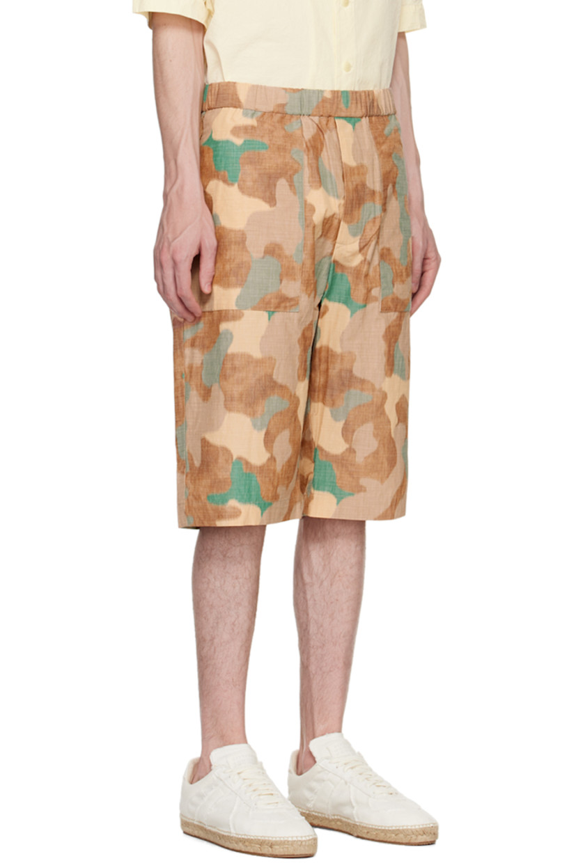 Plain-woven cotton and polyester-blend shorts. Camouflage pattern printed throughout.

· Concealed drawstring at elasticized waistband
· Three-pocket styling
· Button-fly
· Corozo hardware

Available exclusively at SSENSE.

Supplier color: Khaki