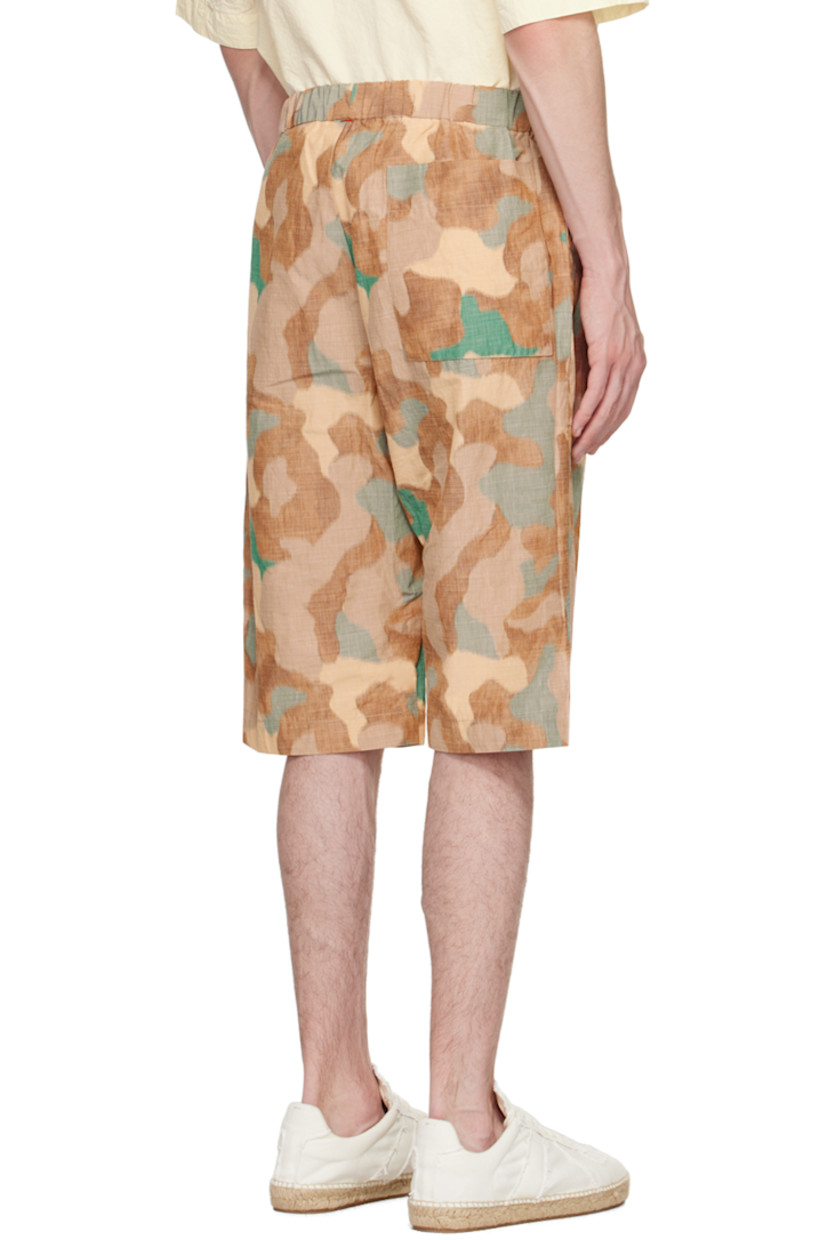 Plain-woven cotton and polyester-blend shorts. Camouflage pattern printed throughout.

· Concealed drawstring at elasticized waistband
· Three-pocket styling
· Button-fly
· Corozo hardware

Available exclusively at SSENSE.

Supplier color: Khaki