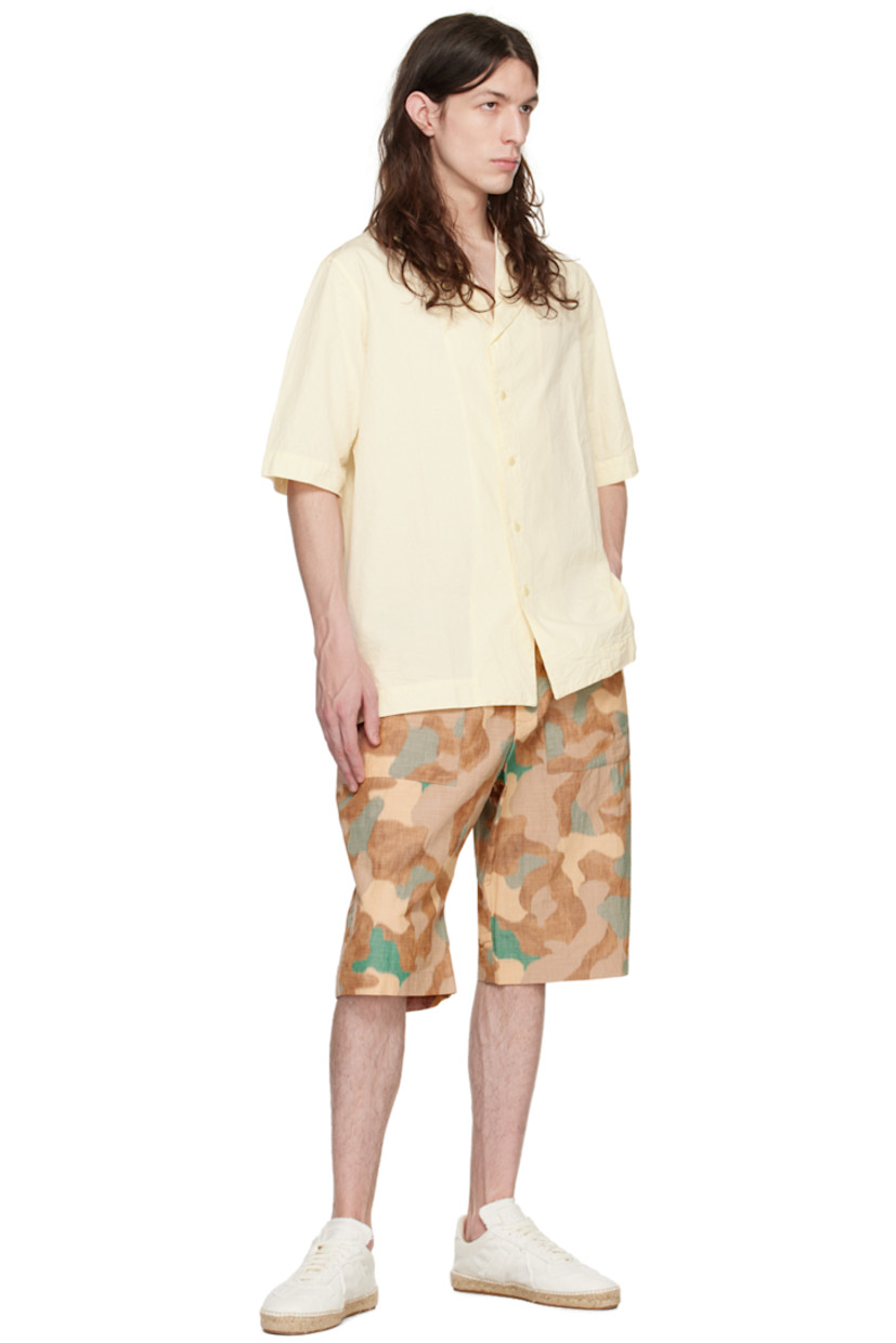 Plain-woven cotton and polyester-blend shorts. Camouflage pattern printed throughout.

· Concealed drawstring at elasticized waistband
· Three-pocket styling
· Button-fly
· Corozo hardware

Available exclusively at SSENSE.

Supplier color: Khaki