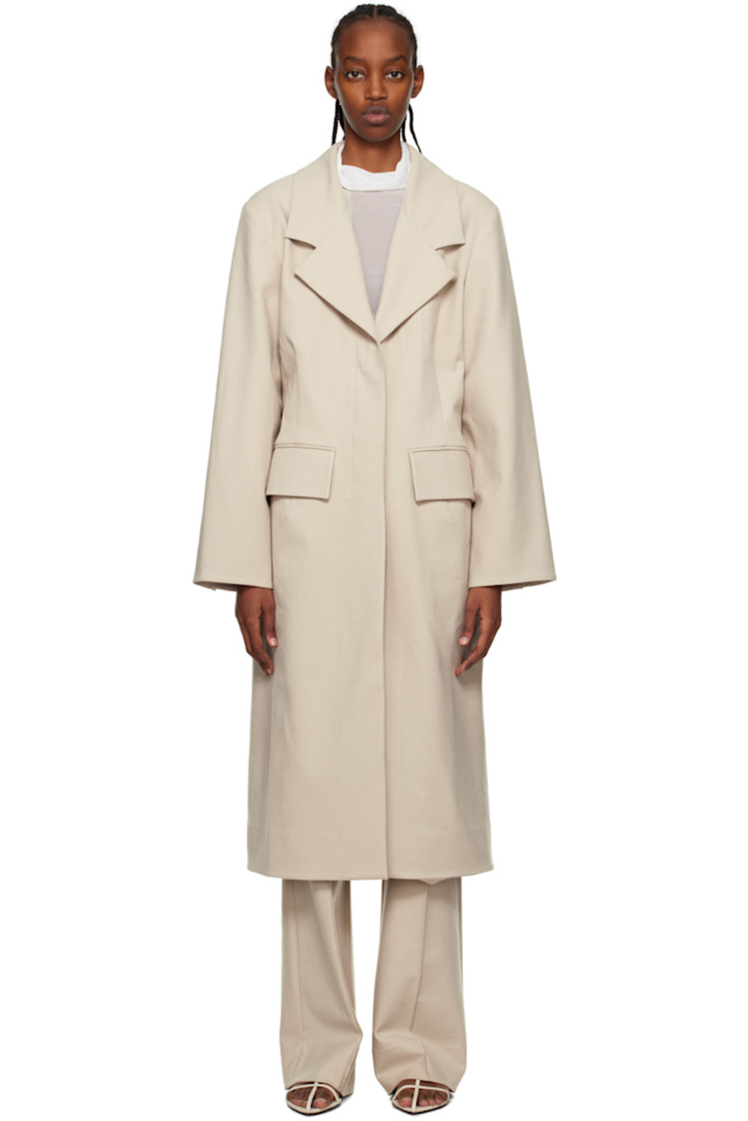 Brushed stretch polyester- and rayon-blend twill coat.

· Notched lapel
· Concealed button closure
· Flap pockets
· Padded shoulders
· Vented cuffs
· Central vent at back hem
· Full cupro twill lining

Supplier color: Taupe