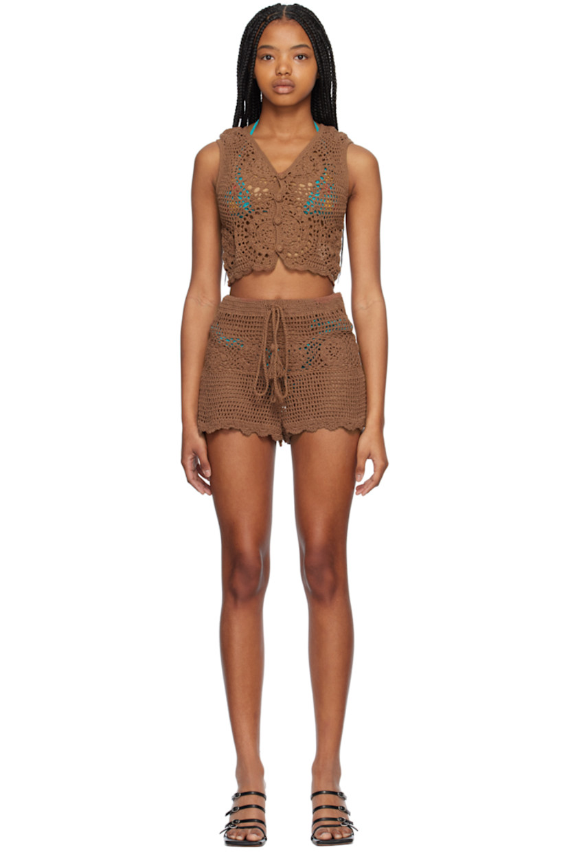 Hand-crocheted cotton vest.

· V-neck
· Button closure
· Scalloped edge at hem

Hand-crocheted cotton shorts.

· Drawstring at elasticized waistband
· Scalloped edge at hem

Supplier color: Brown
