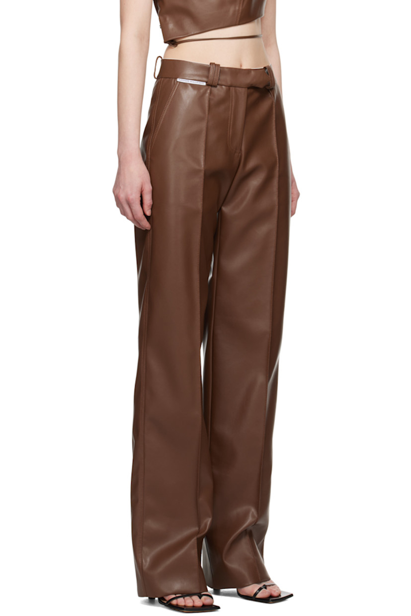 Straight-leg grained faux-leather trousers.

· Belt loops
· Three-pocket styling
· Zip-fly
· Logo flag at waistband
· Pinched seams at front
· Full cotton poplin lining

Supplier color: Brown
