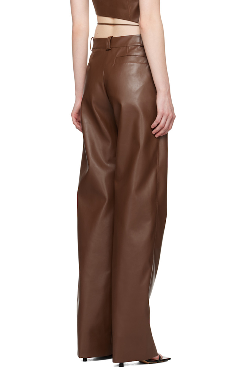 Straight-leg grained faux-leather trousers.

· Belt loops
· Three-pocket styling
· Zip-fly
· Logo flag at waistband
· Pinched seams at front
· Full cotton poplin lining

Supplier color: Brown