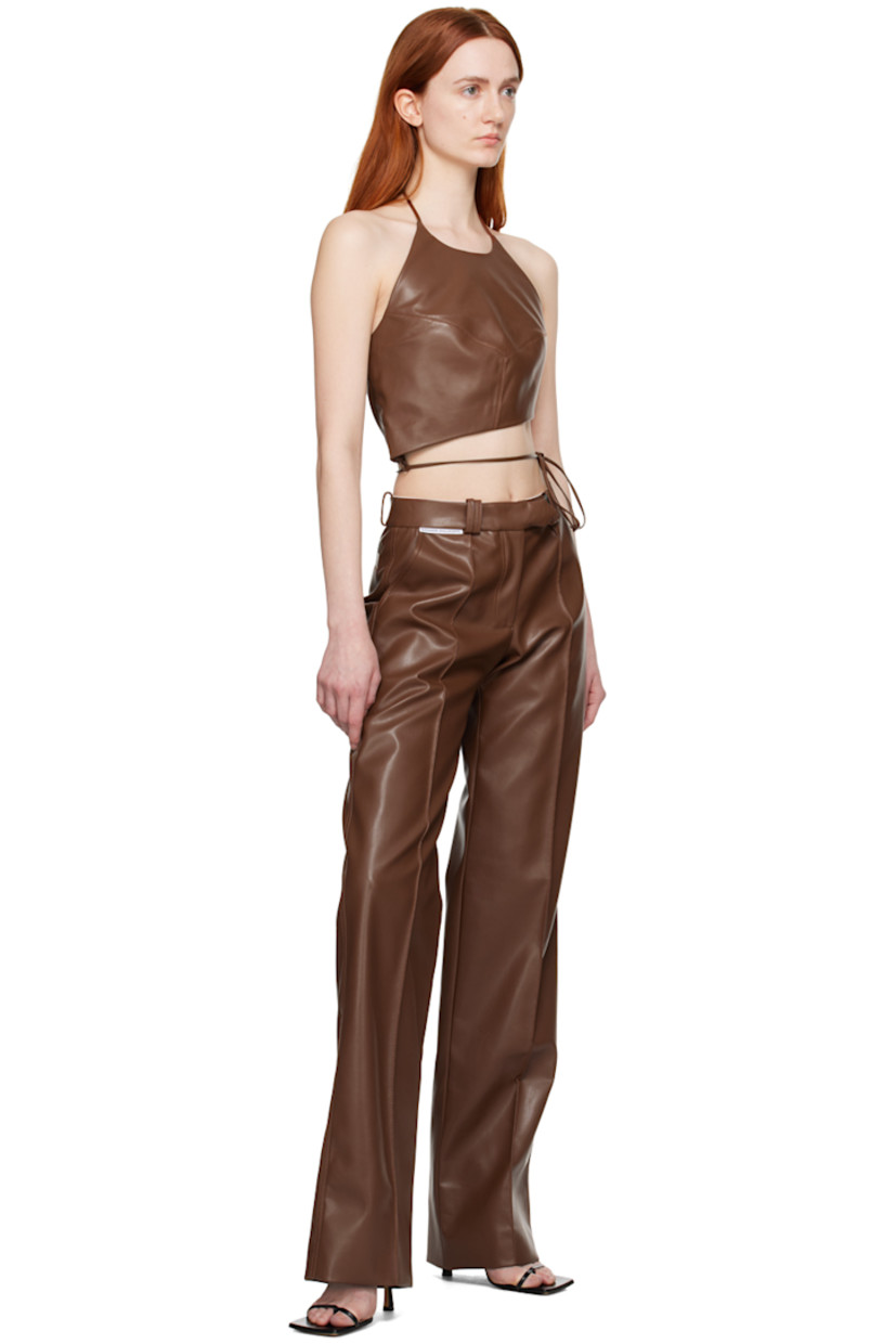 Straight-leg grained faux-leather trousers.

· Belt loops
· Three-pocket styling
· Zip-fly
· Logo flag at waistband
· Pinched seams at front
· Full cotton poplin lining

Supplier color: Brown
