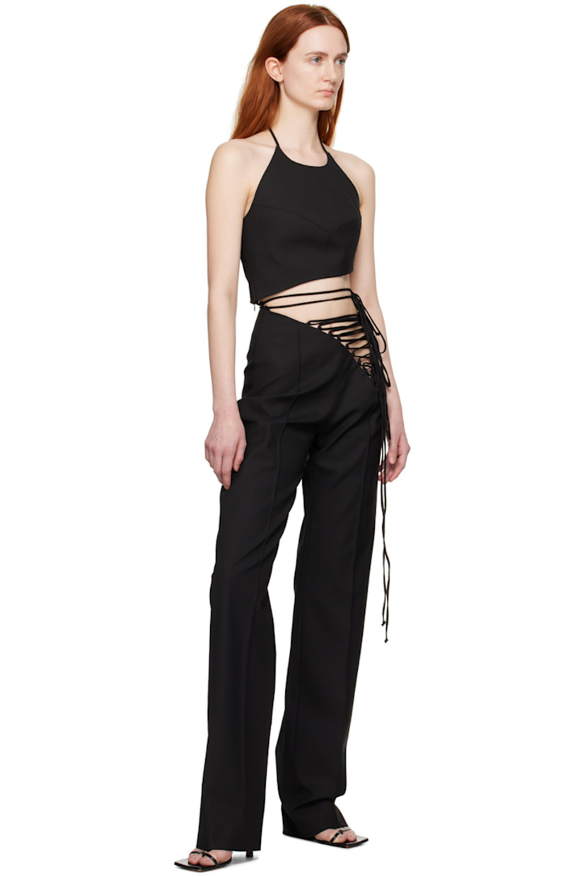 Plain-woven stretch polyester- and viscose-blend tank top.

· Asymmetrical construction
· Self-tie halter strap
· Concealed zip closure at side seams
· Self-tie fastening at waist
· Full poplin lining

Wholesale exclusivity at SSENSE.

Supplier color: Black