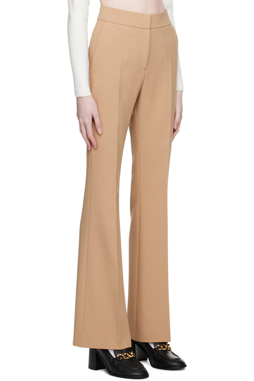 Flared plain-woven stretch polyester-blend trousers. 

· Four-pocket styling
· Zip-fly
· Central crease at legs 

Supplier color: Light/Pastel brown