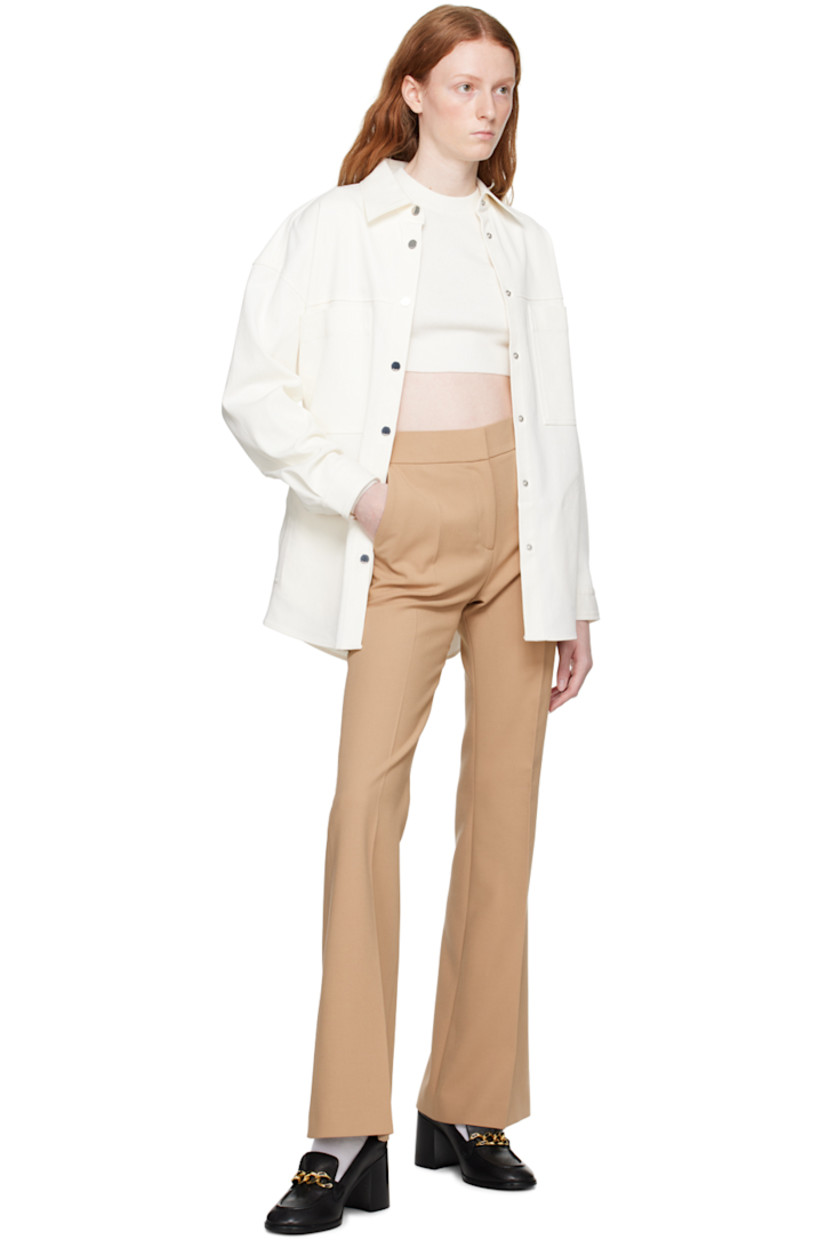 Flared plain-woven stretch polyester-blend trousers. 

· Four-pocket styling
· Zip-fly
· Central crease at legs 

Supplier color: Light/Pastel brown