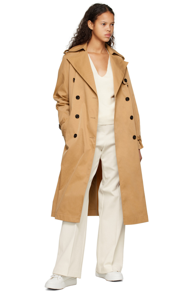 Knit stretch cotton- and nylon-blend trousers.

· Drawstring at elasticized waistband
· Two-pocket styling
· Central seam at front and back legs
· Silver-tone logo hardware at back
· Unlined

Supplier color: Open white