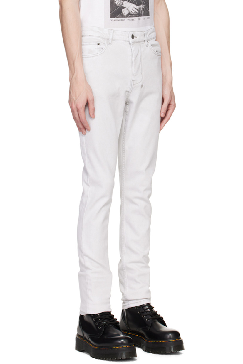 Slim-fit stretch denim jeans. Fading throughout.

· Belt loops
· Five-pocket styling
· Button-fly
· Embroidered logo graphic at back waistband
· Logo-engraved antiqued gunmental-tone hardware

Supplier color: White