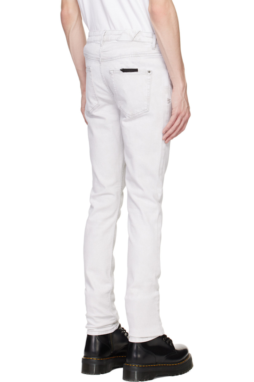 Slim-fit stretch denim jeans. Fading throughout.

· Belt loops
· Five-pocket styling
· Button-fly
· Embroidered logo graphic at back waistband
· Logo-engraved antiqued gunmental-tone hardware

Supplier color: White