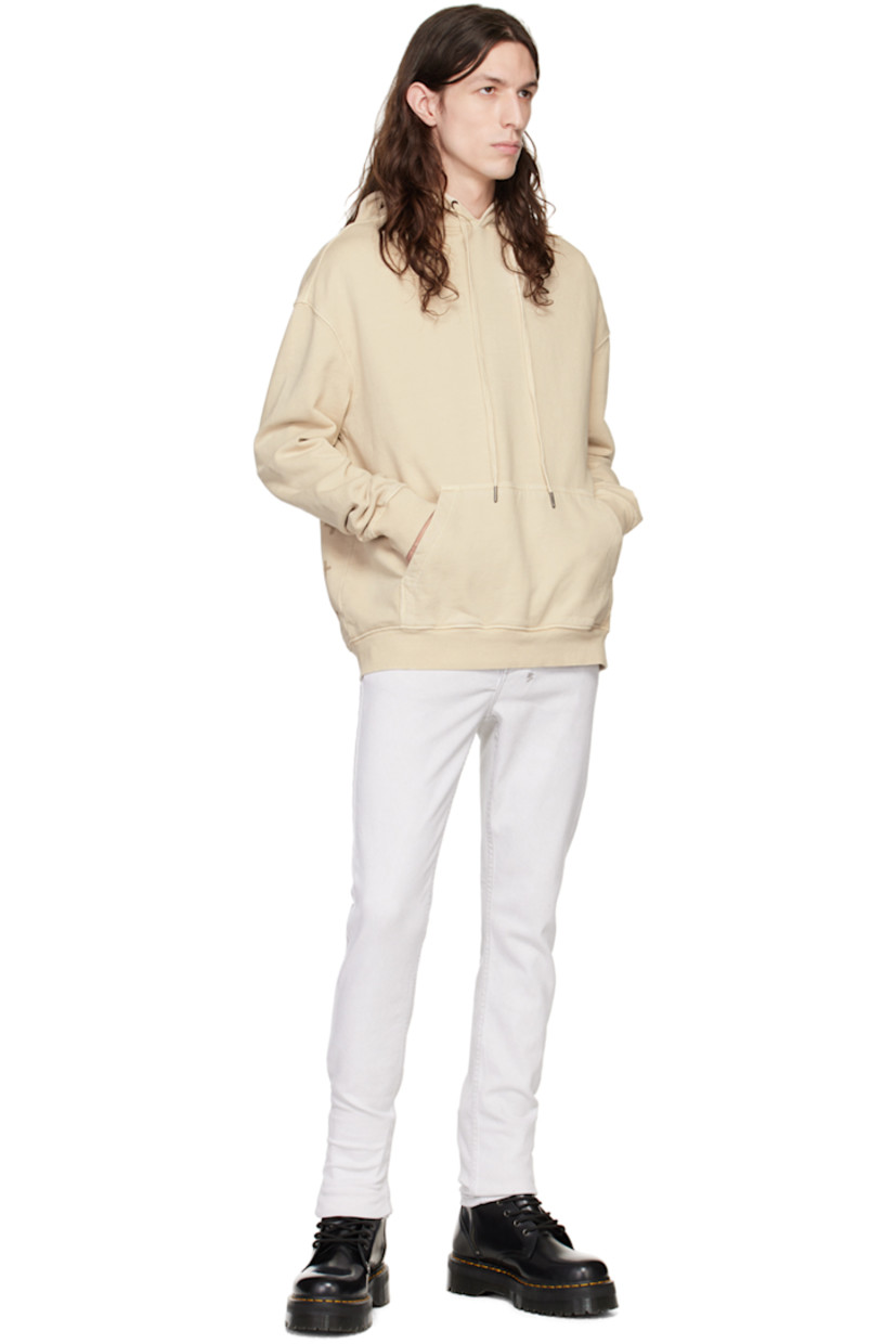Slim-fit stretch denim jeans. Fading throughout.

· Belt loops
· Five-pocket styling
· Button-fly
· Embroidered logo graphic at back waistband
· Logo-engraved antiqued gunmental-tone hardware

Supplier color: White