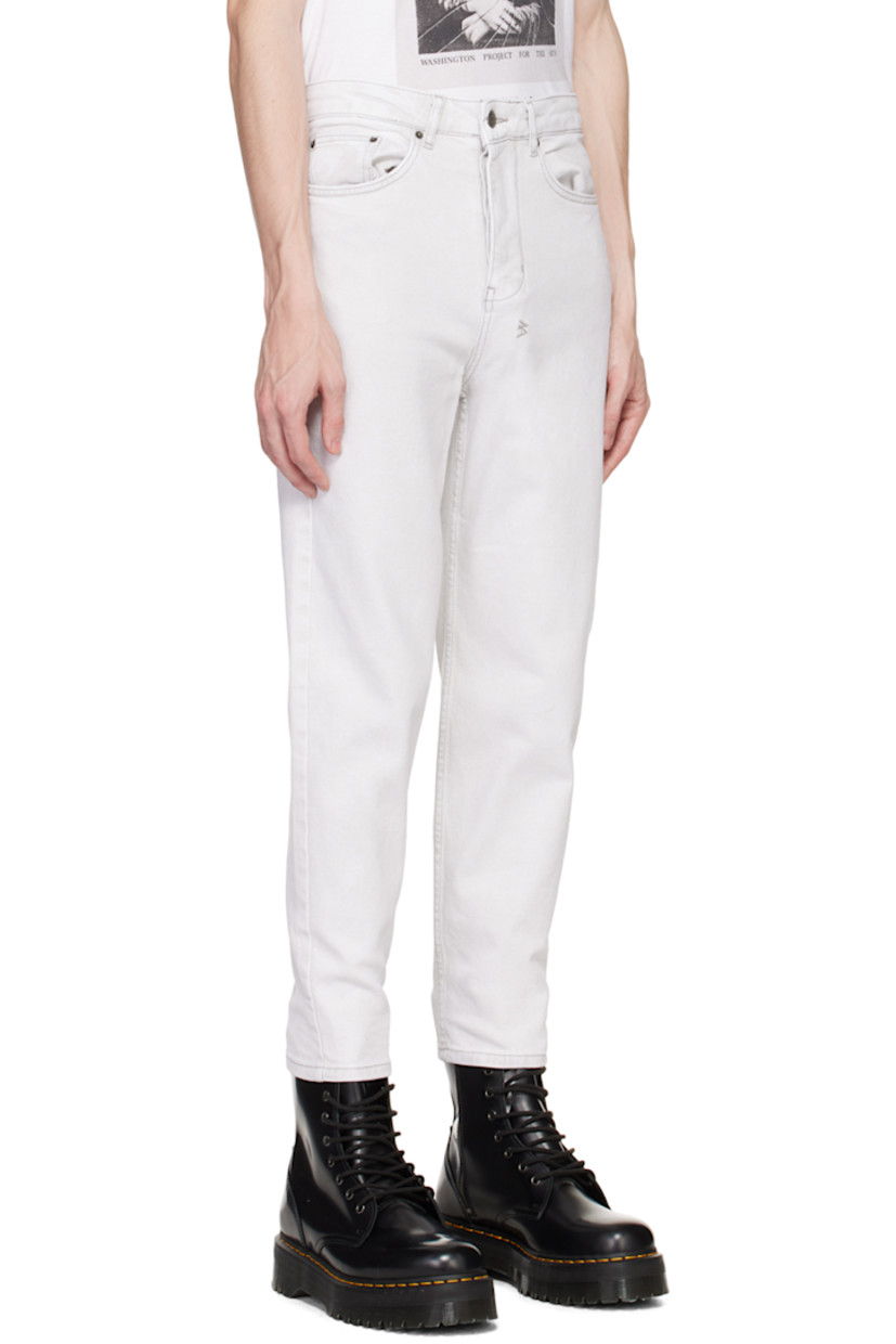 Tapered wide-leg stretch denim jeans. Fading throughout.

· Belt loops
· Five-pocket styling
· Button-fly
· Embroidered logo graphic at back waistband
· Logo-engraved antiqued silver-tone hardware

Supplier color: White