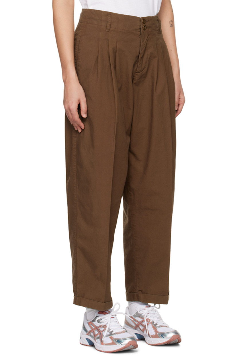 Garment-dyed cotton twill trousers. Topstitching throughout.

· Belt loops
· Double button closure
· Three-pocket styling
· Zip-fly
· Darts at front and back
· Pleats at front
· Rolled cuffs

Supplier color: Brown