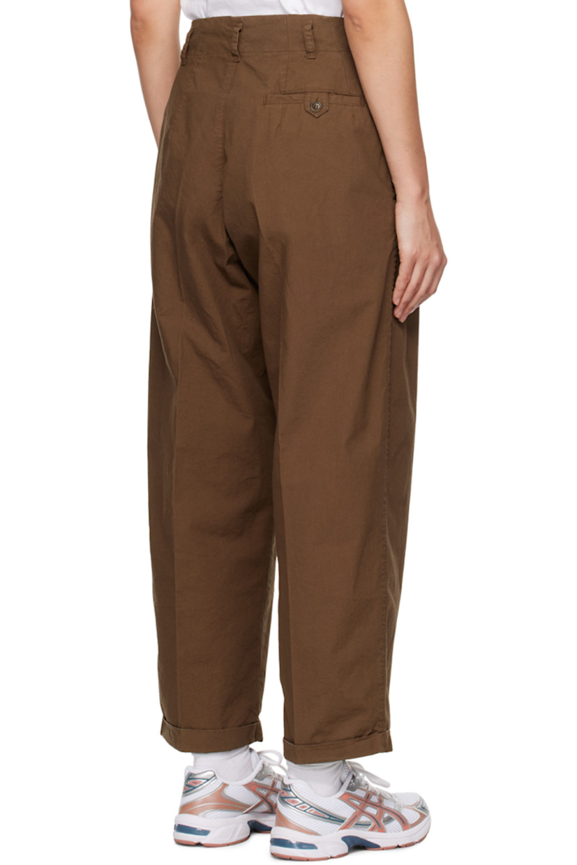 Garment-dyed cotton twill trousers. Topstitching throughout.

· Belt loops
· Double button closure
· Three-pocket styling
· Zip-fly
· Darts at front and back
· Pleats at front
· Rolled cuffs

Supplier color: Brown