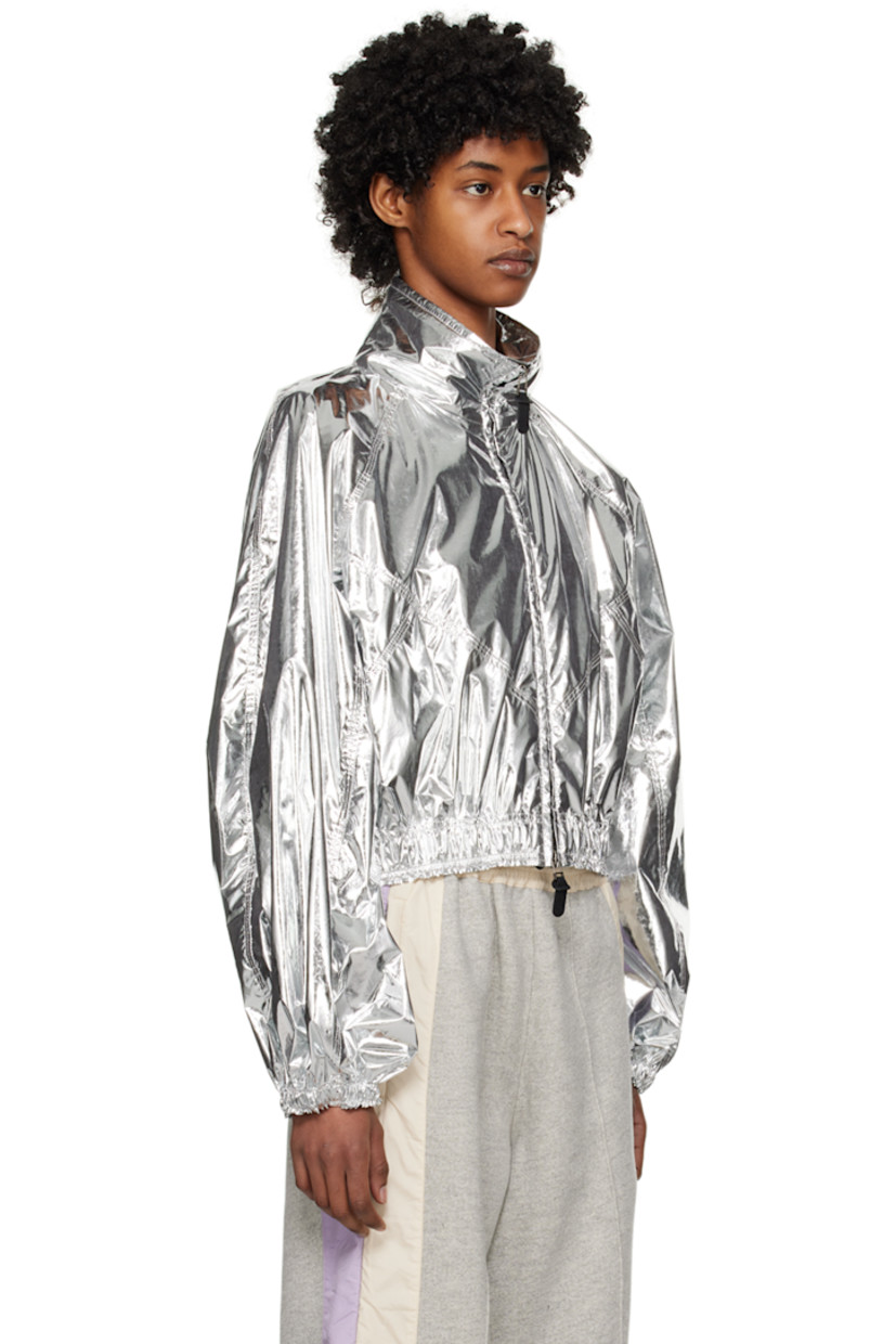Polyester lamé jacket.

· Stand collar
· Two-way zip closure
· Elasticized hem and cuffs
· Logo patch at sleeve
· Patch pockets at interior
· Unlined

Part of the Moncler Genius x Alicia Keys collaboration.

Supplier color: Silver