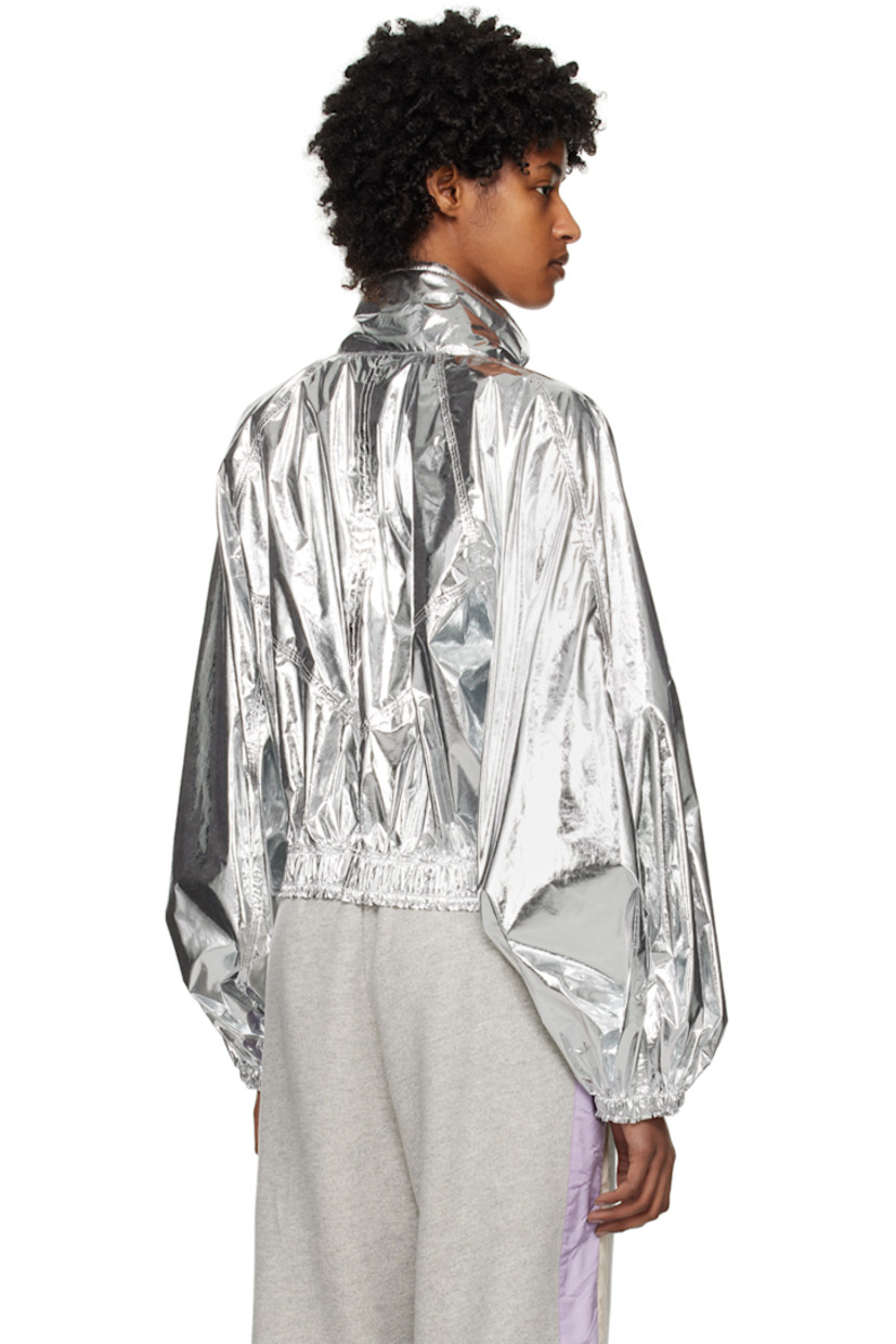 Polyester lamé jacket.

· Stand collar
· Two-way zip closure
· Elasticized hem and cuffs
· Logo patch at sleeve
· Patch pockets at interior
· Unlined

Part of the Moncler Genius x Alicia Keys collaboration.

Supplier color: Silver