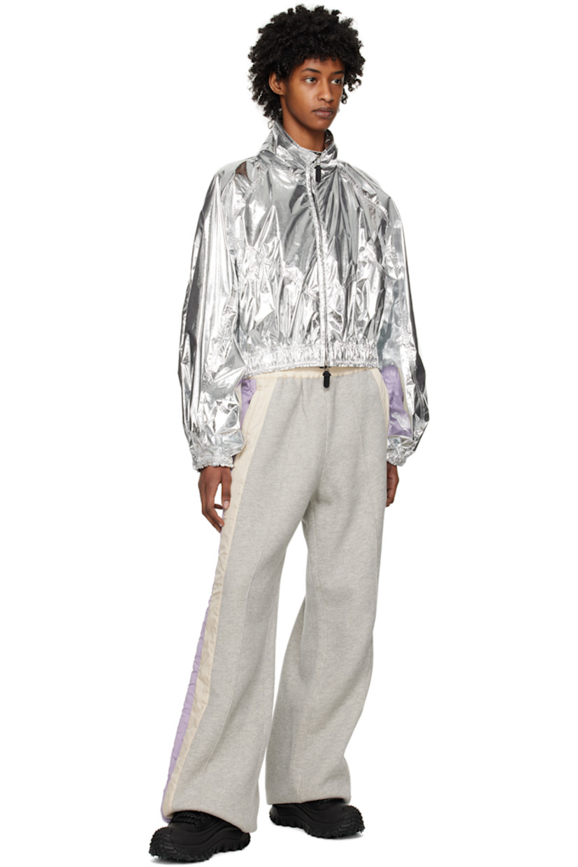 Polyester lamé jacket.

· Stand collar
· Two-way zip closure
· Elasticized hem and cuffs
· Logo patch at sleeve
· Patch pockets at interior
· Unlined

Part of the Moncler Genius x Alicia Keys collaboration.

Supplier color: Silver