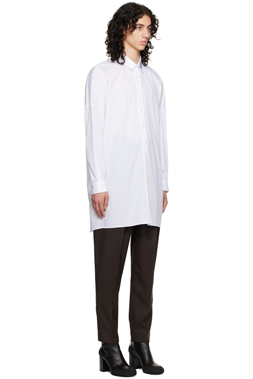 Cotton poplin shirt.

· Logo embrodiered at spread collar
· Button closure
· Two-button barrel cuffs

Supplier color: White