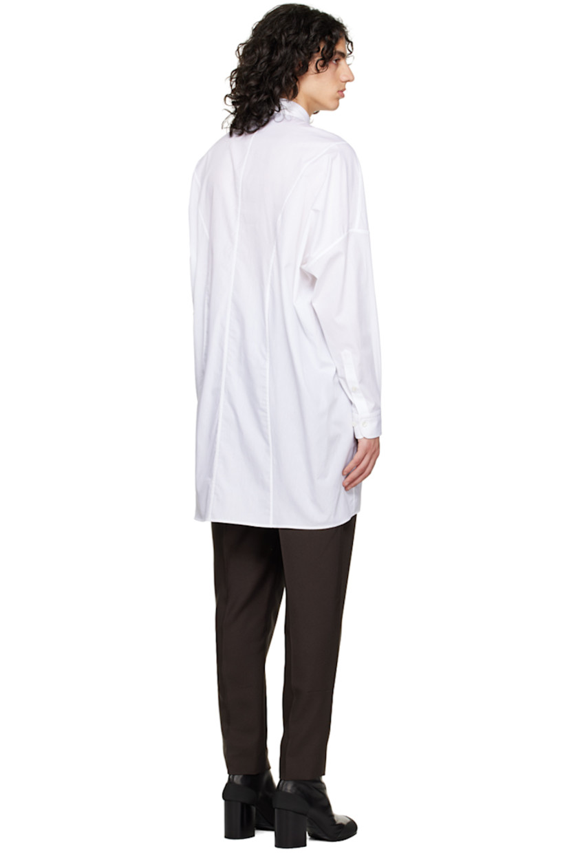 Cotton poplin shirt.

· Logo embrodiered at spread collar
· Button closure
· Two-button barrel cuffs

Supplier color: White