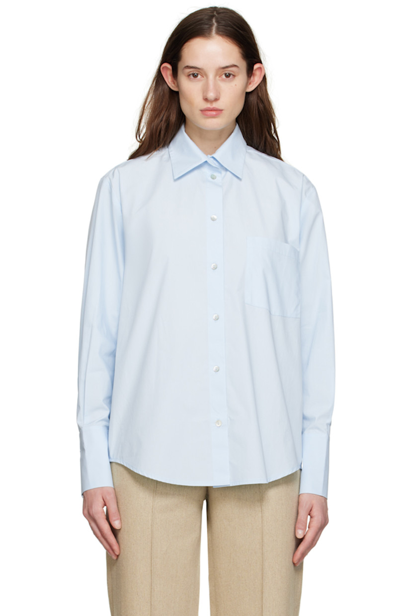 Cotton poplin shirt.

· Spread collar
· Button closure
· Patch pocket
· Shirttail hem
· Three-button barrel cuffs

Supplier color: Sky