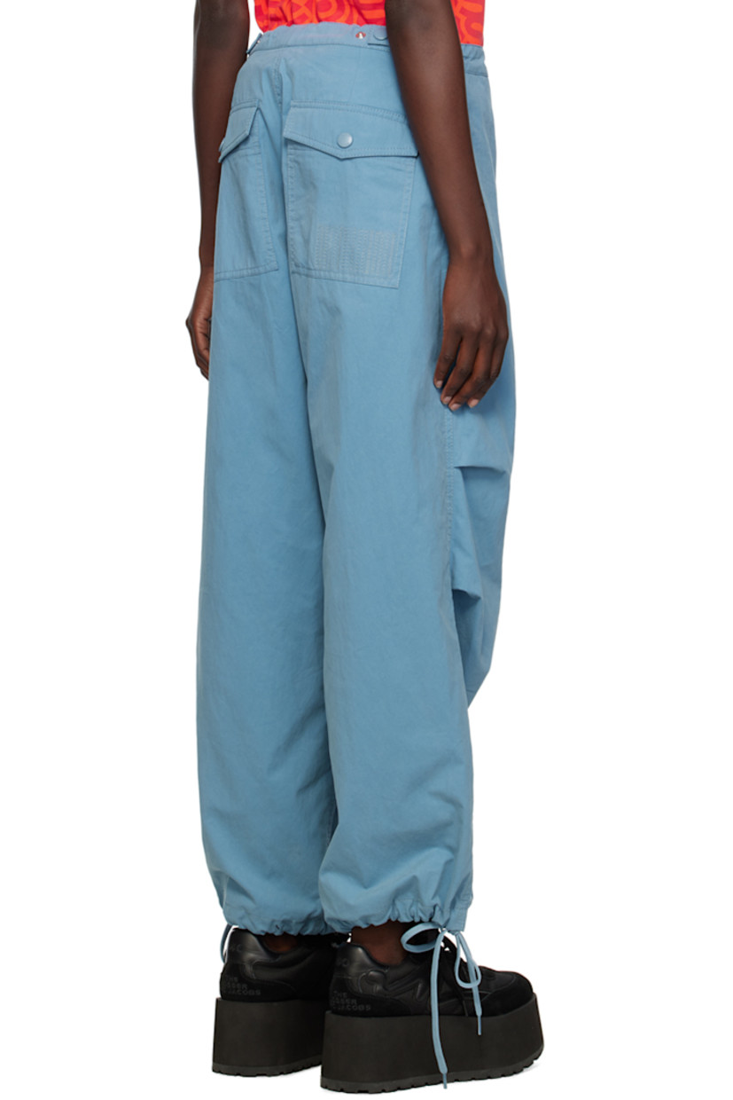 Cotton- and nylon-blend canvas trousers. 

· Drawstring at elasticized waistband
· Four-pocket styling
· Zip-fly
· Gathering at knees
· Drawstring at elasticized cuffs
· Adjustable press-stud tabs at back waistband

Supplier color: Blue shadow