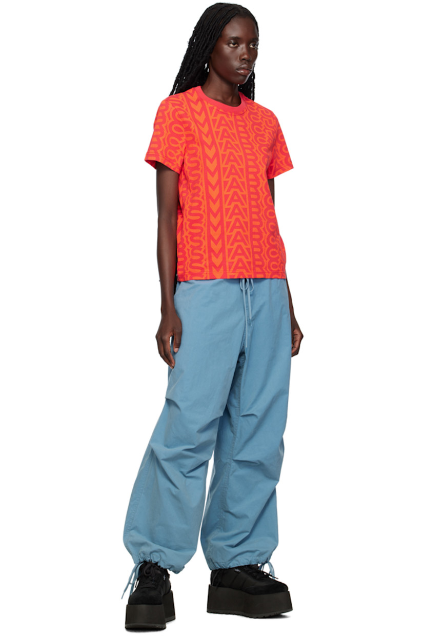 Cotton- and nylon-blend canvas trousers. 

· Drawstring at elasticized waistband
· Four-pocket styling
· Zip-fly
· Gathering at knees
· Drawstring at elasticized cuffs
· Adjustable press-stud tabs at back waistband

Supplier color: Blue shadow