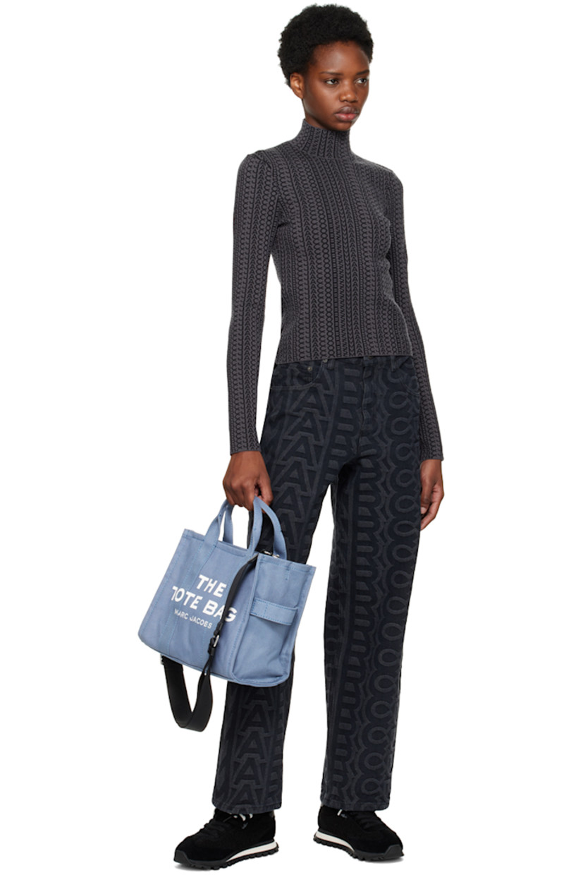 Knit stretch wool-blend turtleneck. Jacquard logo pattern throughout.

· Mock neck
· Logo flag at side seam

Supplier color: Black/Charcoal
