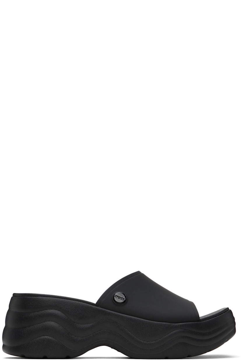TPU slip-on heeled sandals in black.

· Open square toe
· Logo embossed at molded footbed
· Croslite™ foam rubber platform sole
· Platform: H1.5 in
· Heel: H2 in

Supplier color: Black