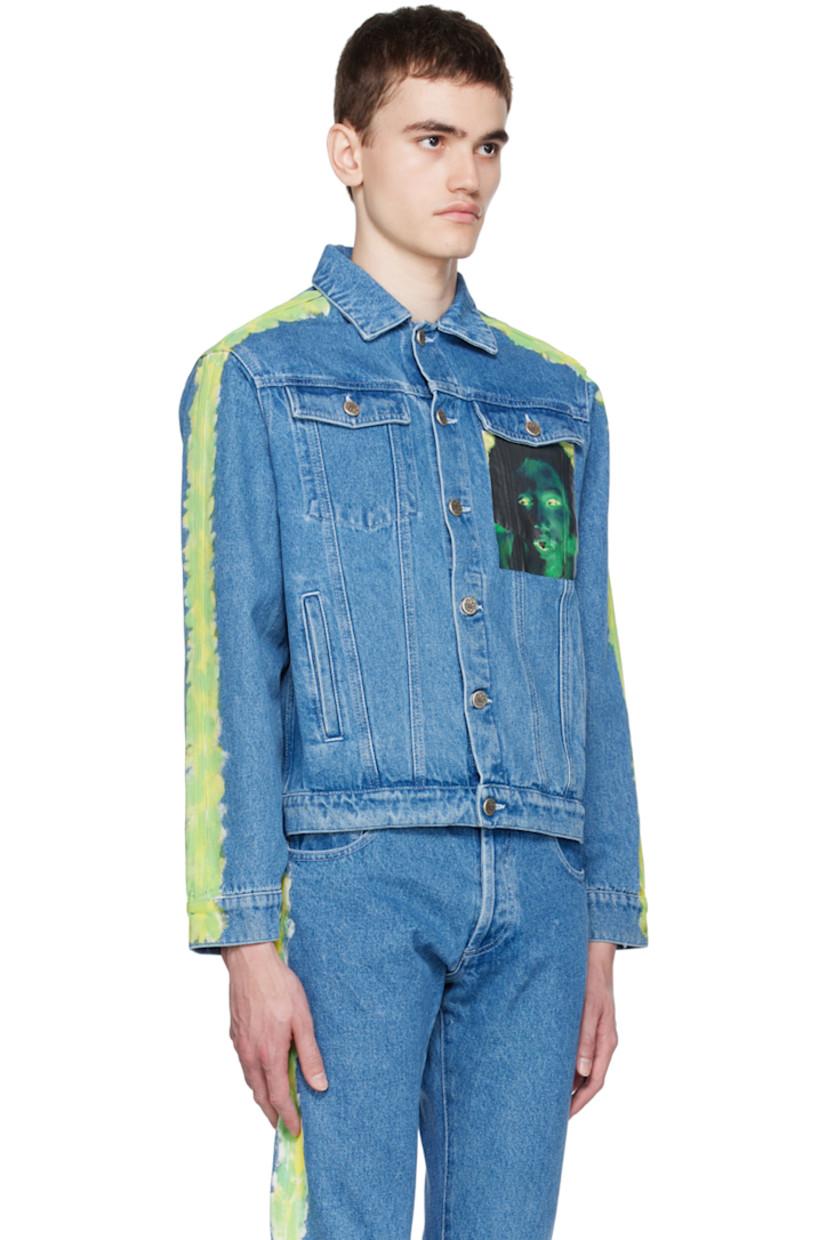 Non-stretch denim jacket. 

· Spread collar
· Button closure
· Flap pockets and welt pockets
· Graphic bonded at chest
· Graphic pattern printed at sleeves
· Single-button barrel cuffs
· Button tabs and logo patch at back hem

Part of the Sky High Farm Workwear x Quil Lemons collaboration.

Supplier color: Light blue