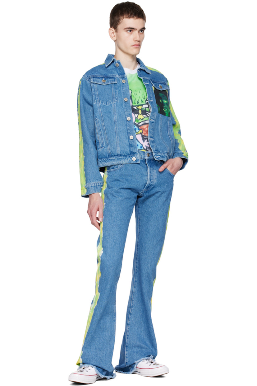 Non-stretch denim jacket. 

· Spread collar
· Button closure
· Flap pockets and welt pockets
· Graphic bonded at chest
· Graphic pattern printed at sleeves
· Single-button barrel cuffs
· Button tabs and logo patch at back hem

Part of the Sky High Farm Workwear x Quil Lemons collaboration.

Supplier color: Light blue