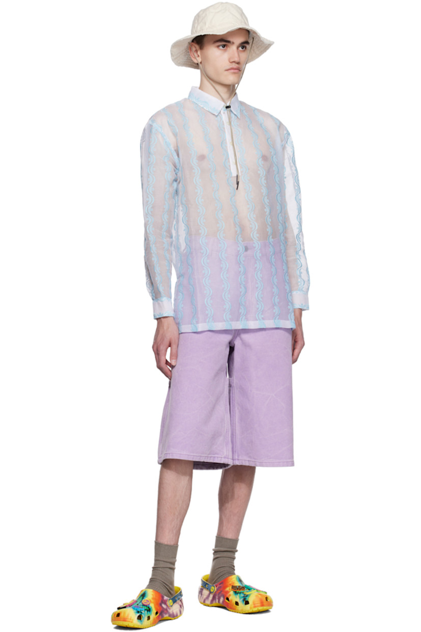 Sheer cotton organza shirt. Graphic pattern embroidered throughout.

· Spread collar
· Three-button placket
· Vented side seams
· Single-button barrel cuffs

Supplier color: White