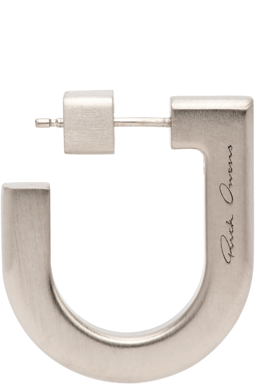 Single open hoop earring in brushed sterling silver.

· Logo at side
· Post-stud fastening
· Full hallmarking
· D1"

Supplier color: Silver