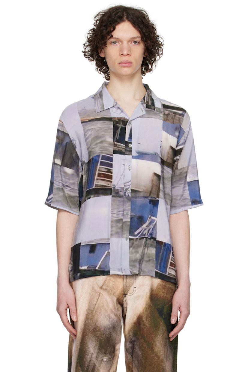 Silk crepe shirt. Graphic pattern printed throughout.

· Open spread collar
· Button closure

Supplier color: Blue boat grid