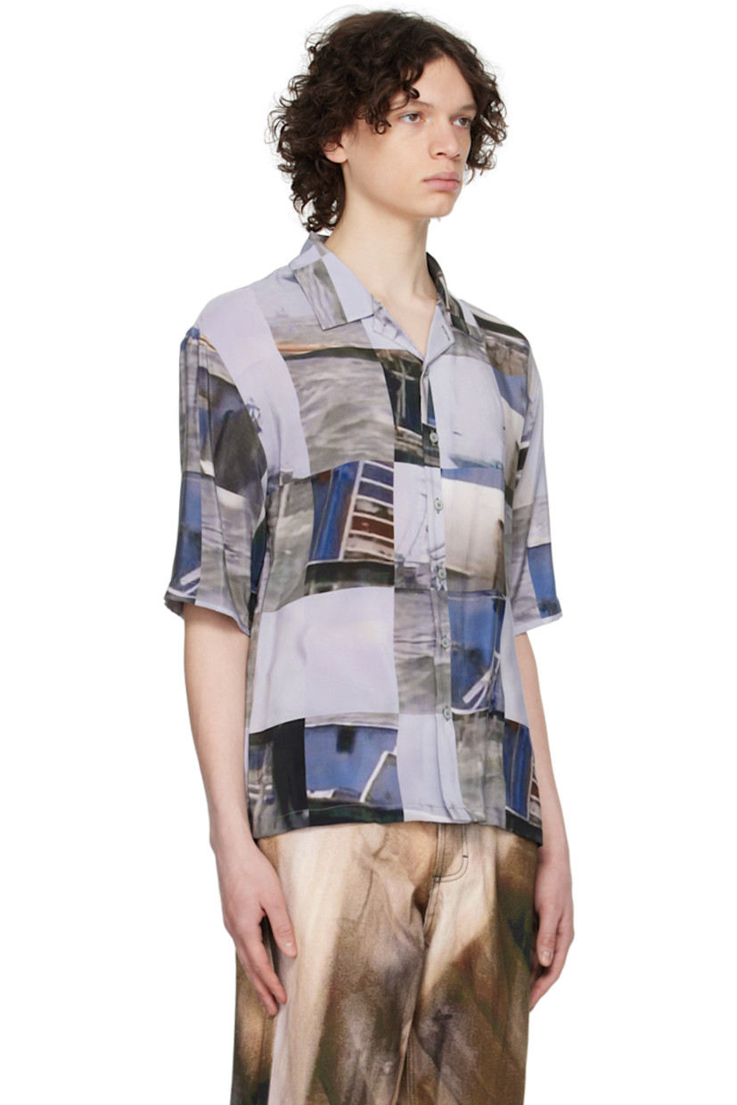 Silk crepe shirt. Graphic pattern printed throughout.

· Open spread collar
· Button closure

Supplier color: Blue boat grid