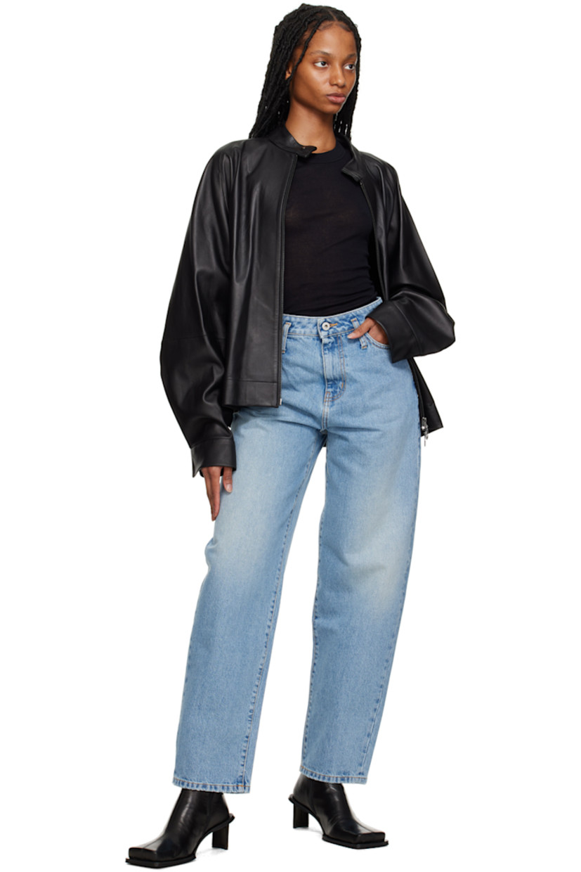 Relaxed-fit non-stretch denim jeans. Fading throughout. 

· Belt loops 
· Five-pocket styling 
· Zip-fly 
· Logo patch at back 
· Contrast stitching in orange 

Supplier color: Dusty blue