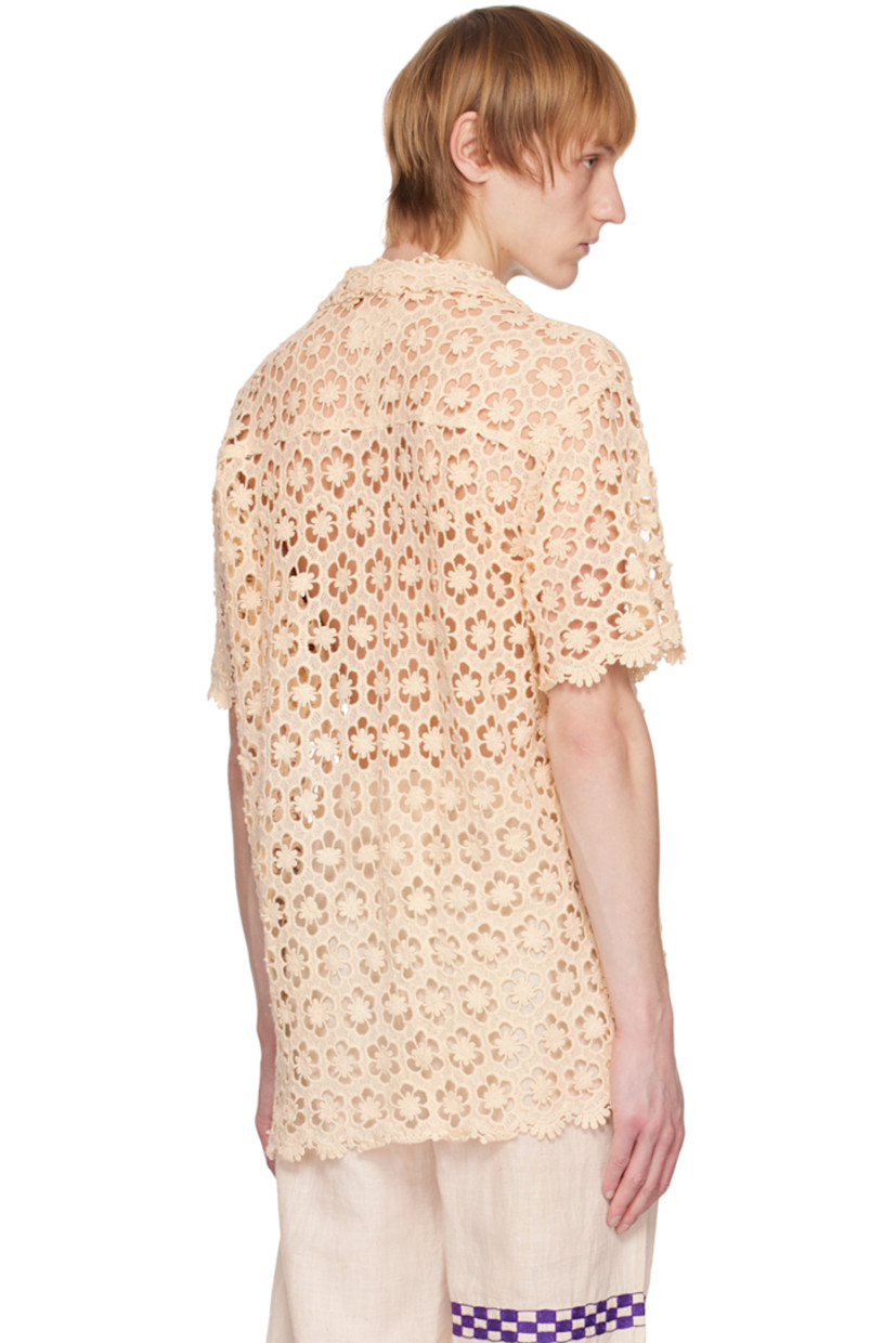 Handcrafted cotton lace shirt.

· Open spread collar
· Button closure

Available exclusively at SSENSE.

Supplier color: White