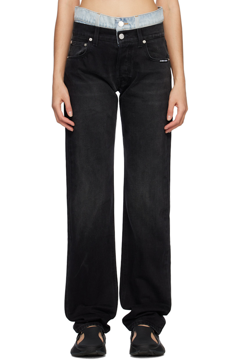Non-stretch denim jeans. Fading and whiskering throughout.

· Layered and paneled construction
· Belt loops
· Five-pocket styling
· Button-fly
· Textile logo patch at front pocket
· Leather logo patches at back waistband
· Logo-engraved silver-tone hardware

Supplier color: Black/Light blue