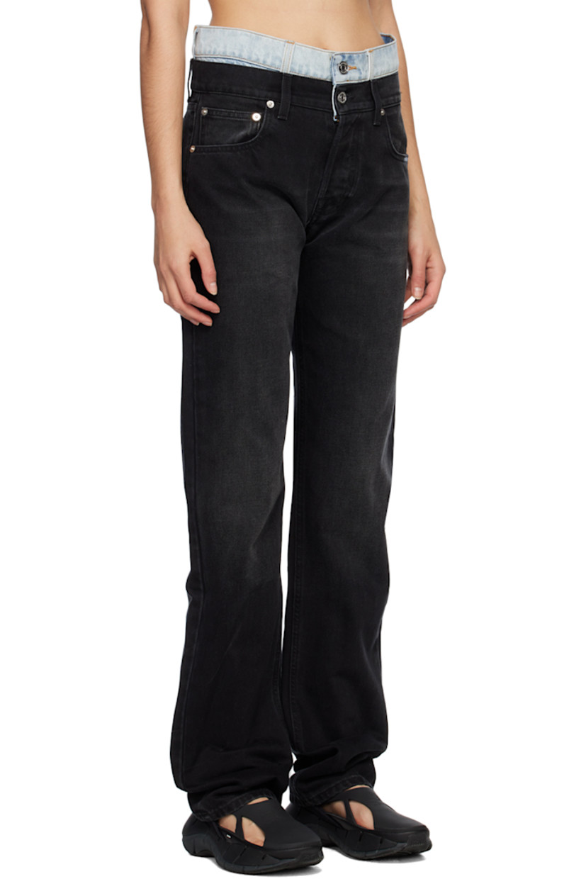 Non-stretch denim jeans. Fading and whiskering throughout.

· Layered and paneled construction
· Belt loops
· Five-pocket styling
· Button-fly
· Textile logo patch at front pocket
· Leather logo patches at back waistband
· Logo-engraved silver-tone hardware

Supplier color: Black/Light blue