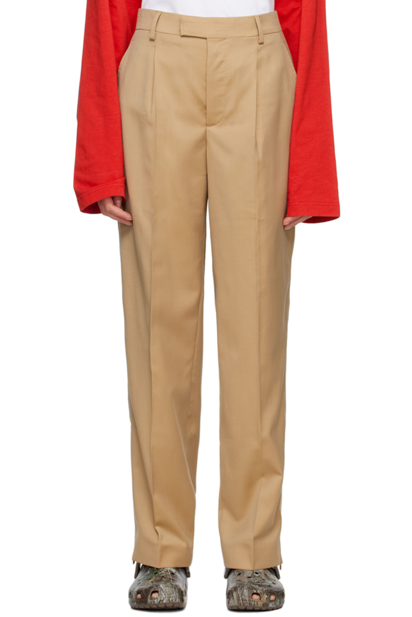 Virgin wool twill trousers.

· Belt loops
· Four-pocket styling
· Zip-fly
�· Creased legs
· Unfinished hem
· Zip vent at cuffs
· Piping at outseams

Supplier color: Salted caramel