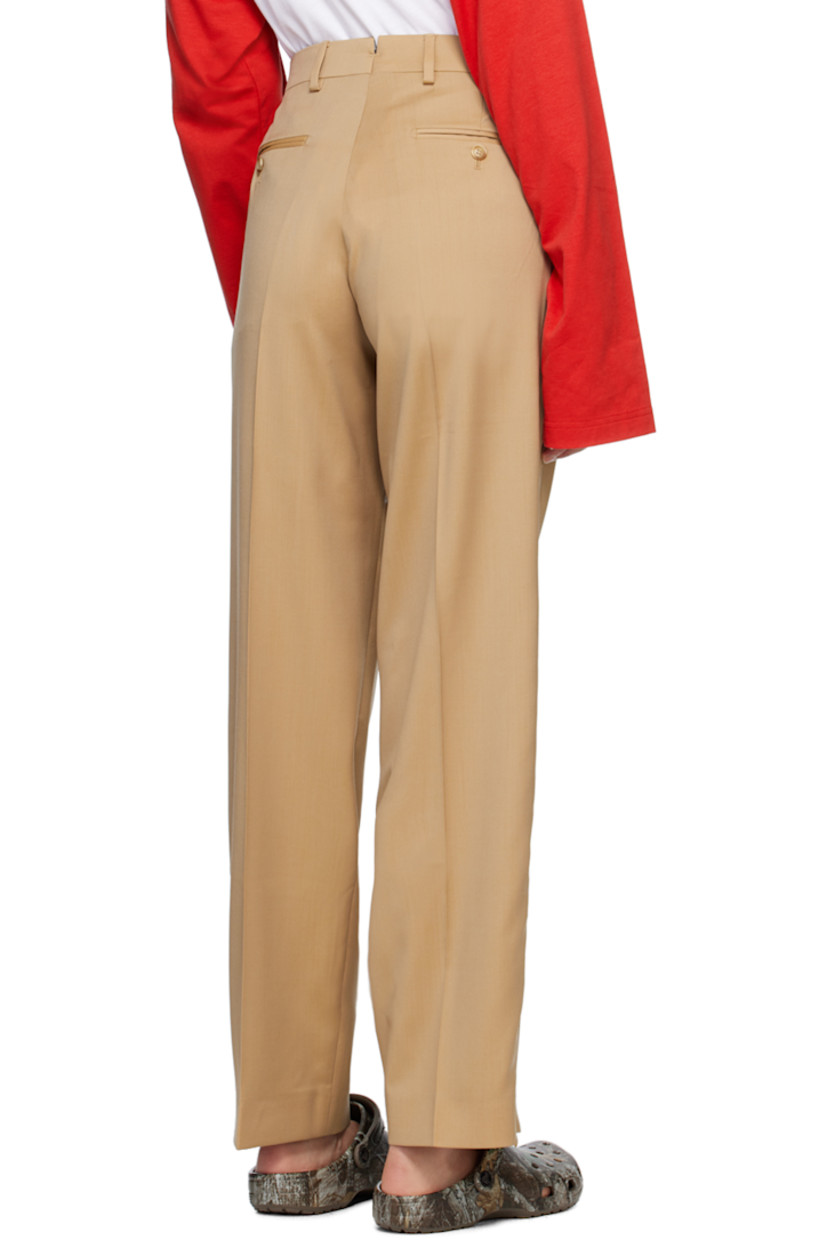 Virgin wool twill trousers.

· Belt loops
· Four-pocket styling
· Zip-fly
· Creased legs
· Unfinished hem
· Zip vent at cuffs
· Piping at outseams

Supplier color: Salted caramel