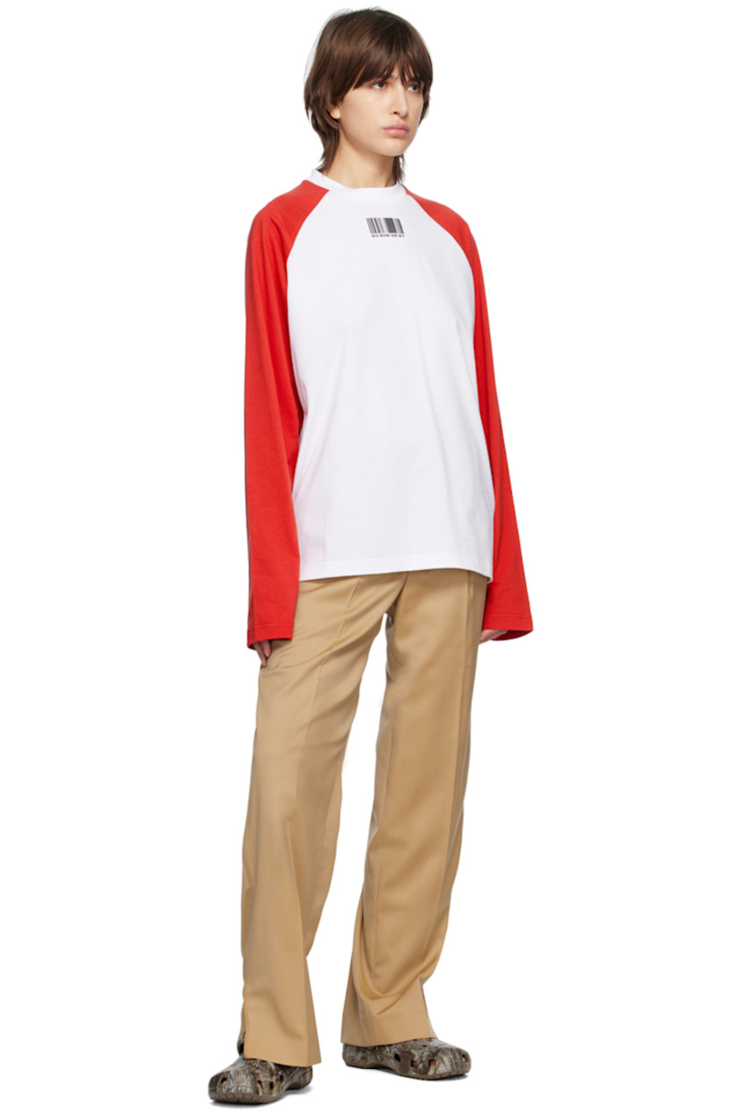 Virgin wool twill trousers.

· Belt loops
· Four-pocket styling
· Zip-fly
· Creased legs
· Unfinished hem
· Zip vent at cuffs
· Piping at outseams

Supplier color: Salted caramel
