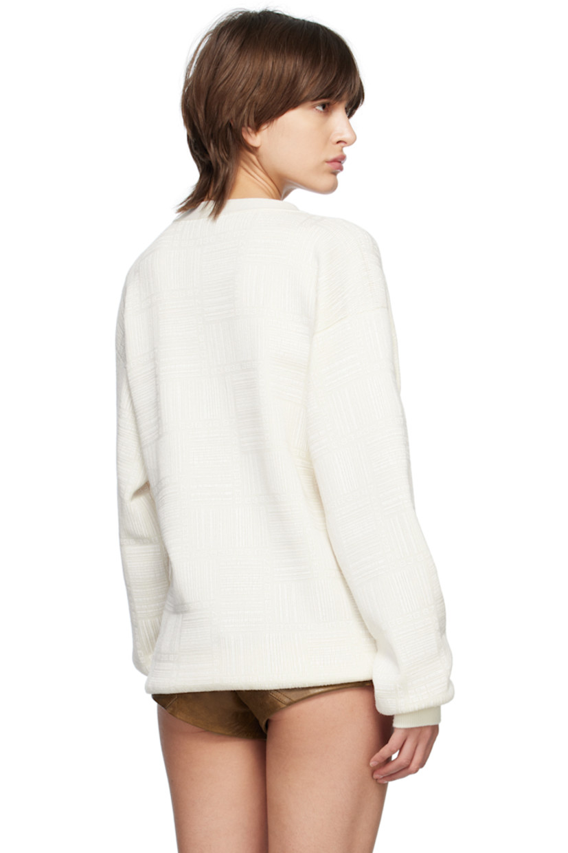 Knit extrafine merino wool cardigan. Logo pattern printed throughout.

· Rib knit Y-neck, hem, and cuffs
· Button closure
· Dropped shoulders

Supplier color: White
