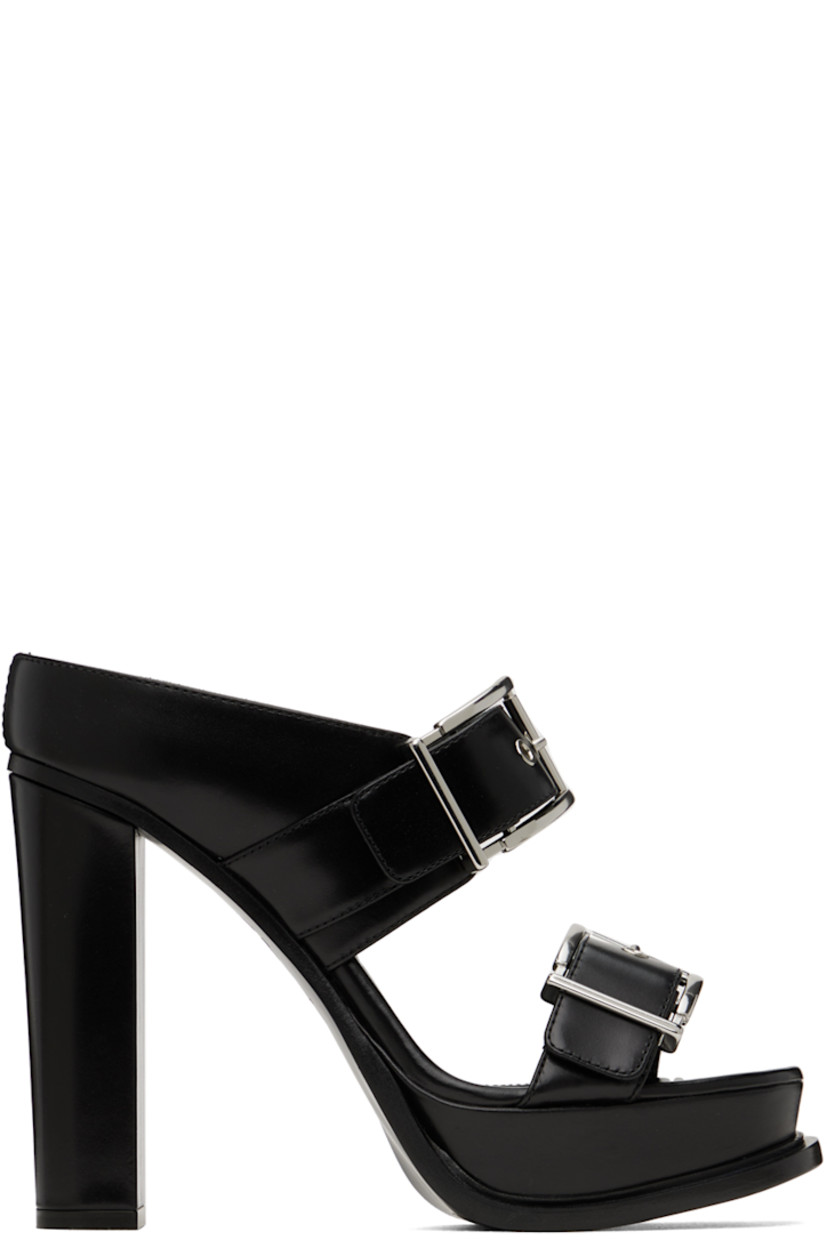 Buffed calfskin slip-on heeled sandals in black. Adjustable pin-buckle straps at vamp.

· Open round toe
· Logo embossed at padded footbed
· Grained leather lining
· Covered block heel and platform midsole
· Leather sole with rubber injection
· Silver-tone hardware
· Platform: 1.5 in
· Heel: 4.5 in

Supplier color: Black/Silver