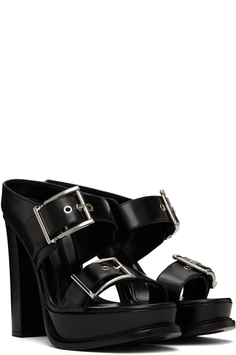 Buffed calfskin slip-on heeled sandals in black. Adjustable pin-buckle straps at vamp.

· Open round toe
· Logo embossed at padded footbed
· Grained leather lining
· Covered block heel and platform midsole
· Leather sole with rubber injection
· Silver-tone hardware
· Platform: 1.5 in
· Heel: 4.5 in

Supplier color: Black/Silver