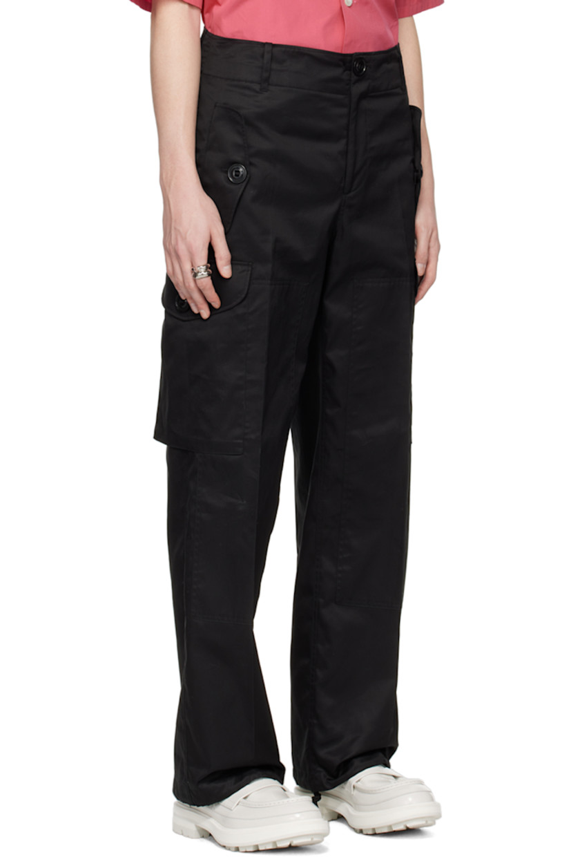 Wide-leg cotton chintz cargo pants.

· Belt loops
· Four-pocket styling
· Zip-fly
· Creased legs
· Drawstring at cuffs
· Flap pocket at outseams

Supplier color: Black