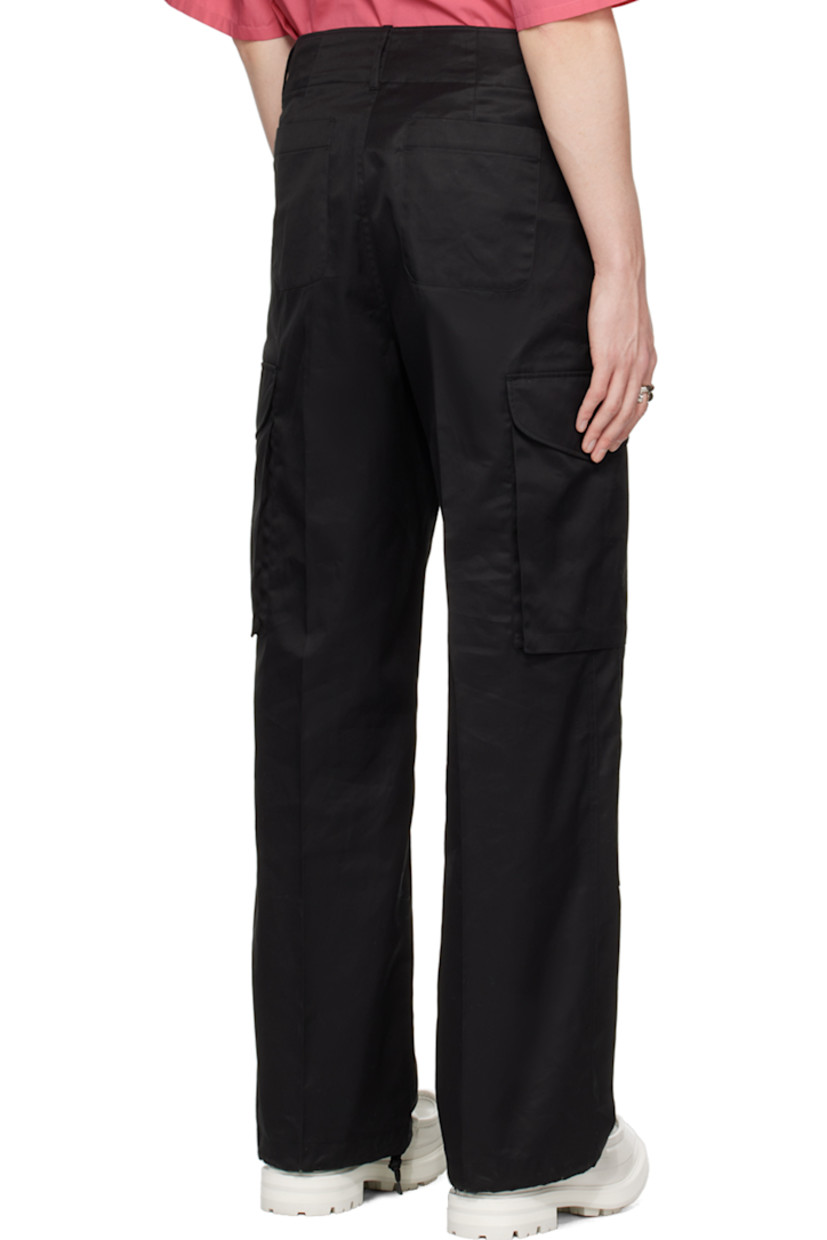 Wide-leg cotton chintz cargo pants.

· Belt loops
· Four-pocket styling
· Zip-fly
· Creased legs
· Drawstring at cuffs
· Flap pocket at outseams

Supplier color: Black